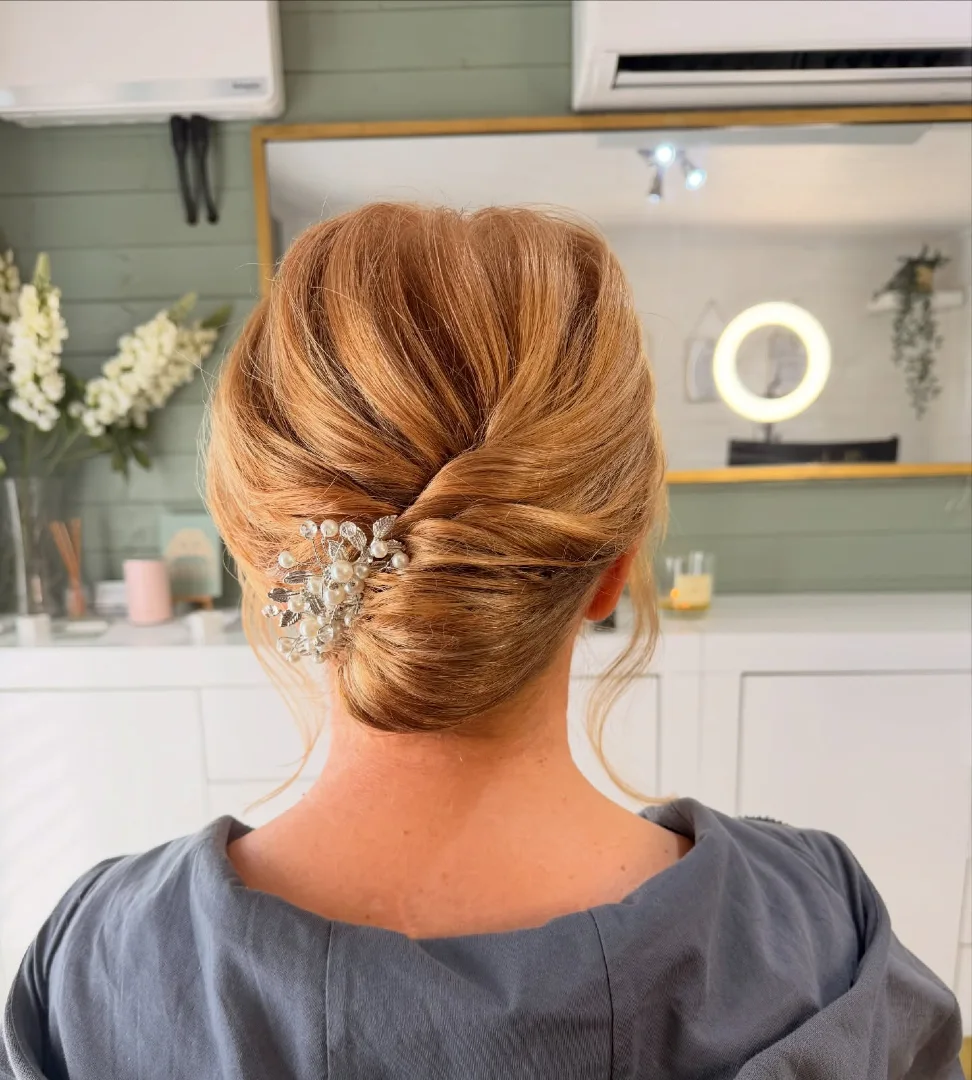 Copper Toned Folded Updo with Pearl Leaf Comb