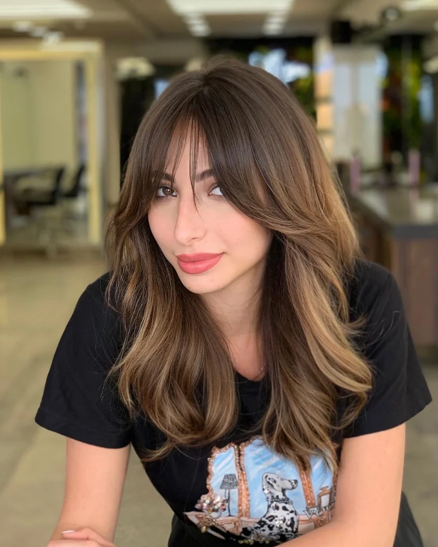 Curtain Bangs on Brown Hair with Caramel Balayage