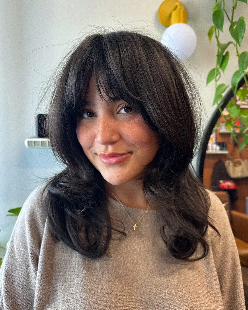 Curtain Bangs on Dark Brown Medium Shag with Flipped Ends