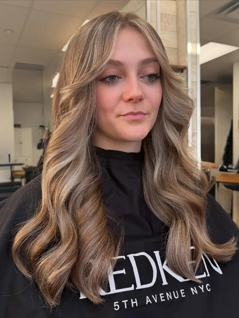 Curtain Bangs on Long Ash Blonde Hair with Glamorous Waves