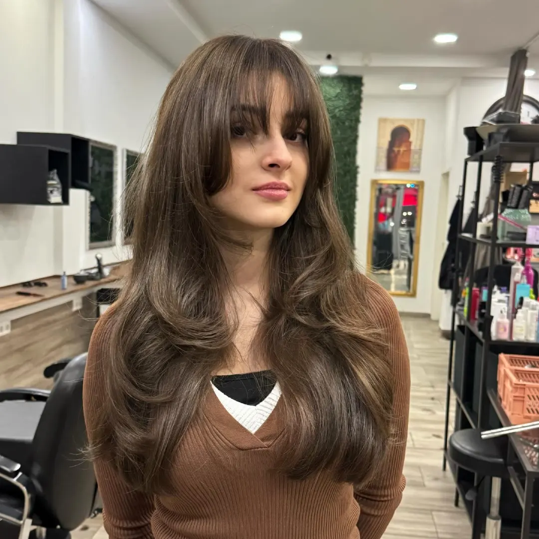 Curtain Bangs on Long Medium Brown Hair with Voluminous Layers