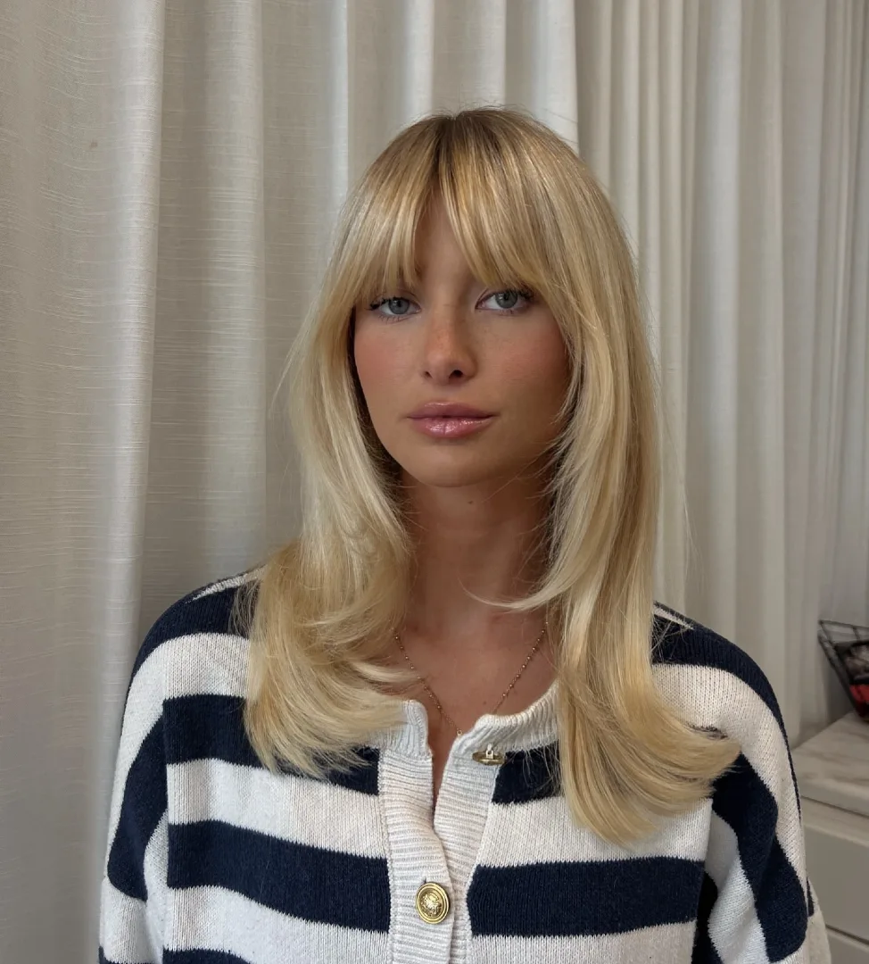 Curtain Bangs on Long Platinum Blonde Hair with Sleek Layers
