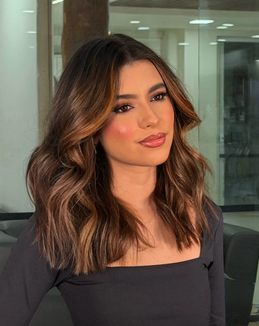 Dark Brown Lob With Auburn Face-Framing Highlights