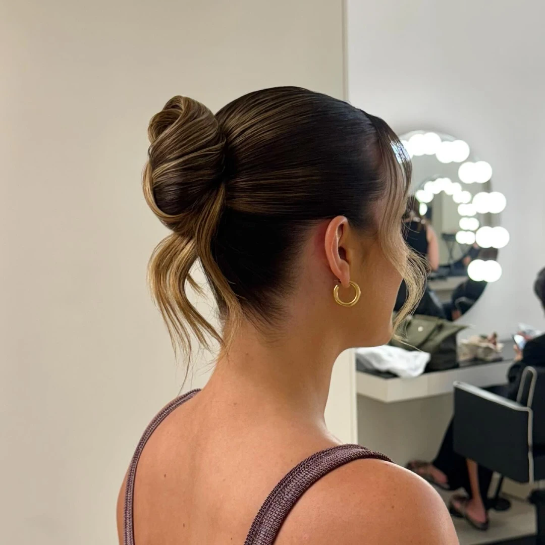 Dark to Blonde Ombre High Bun with Loose Ends