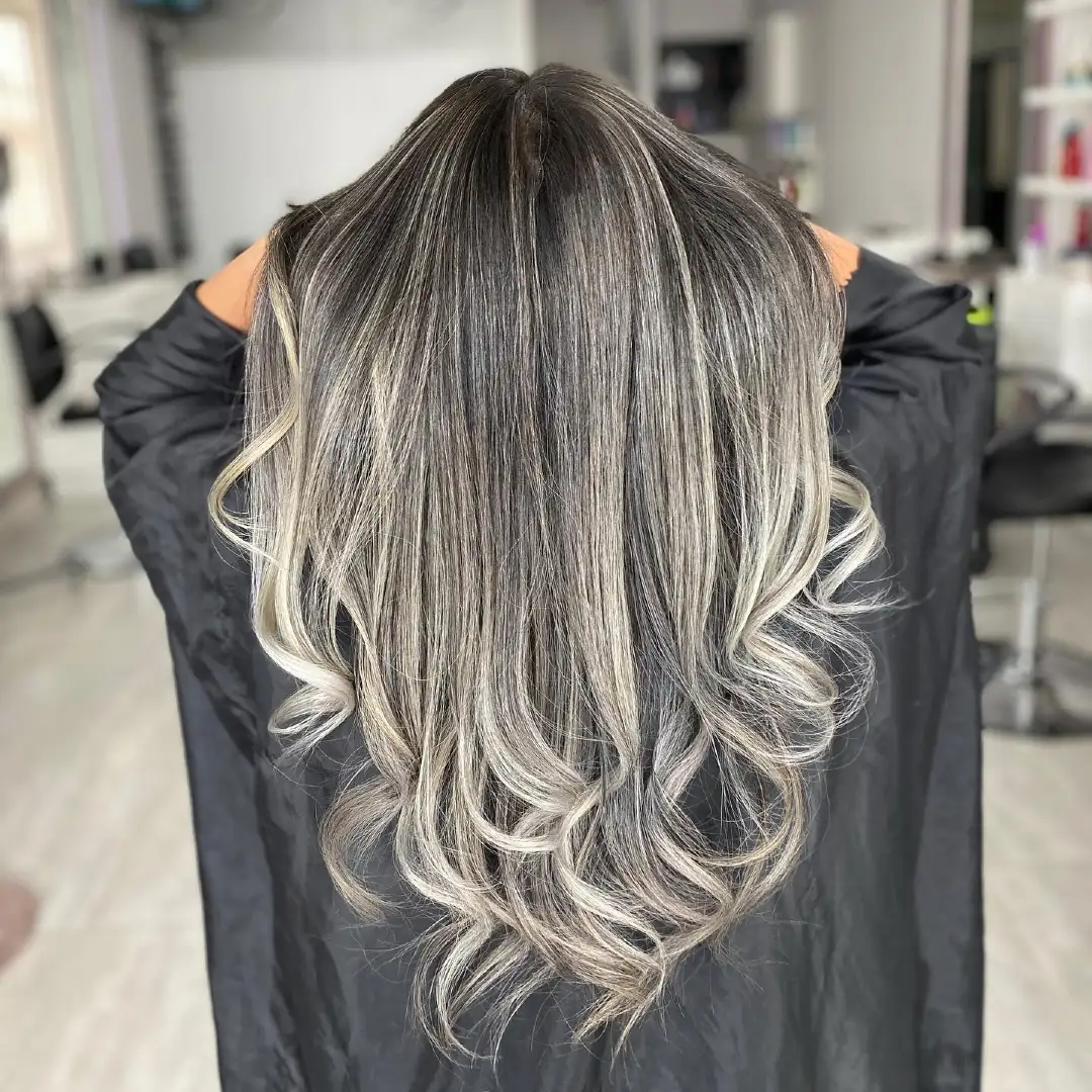 Dark to Platinum Silver Balayage with Dramatic Curl Ends