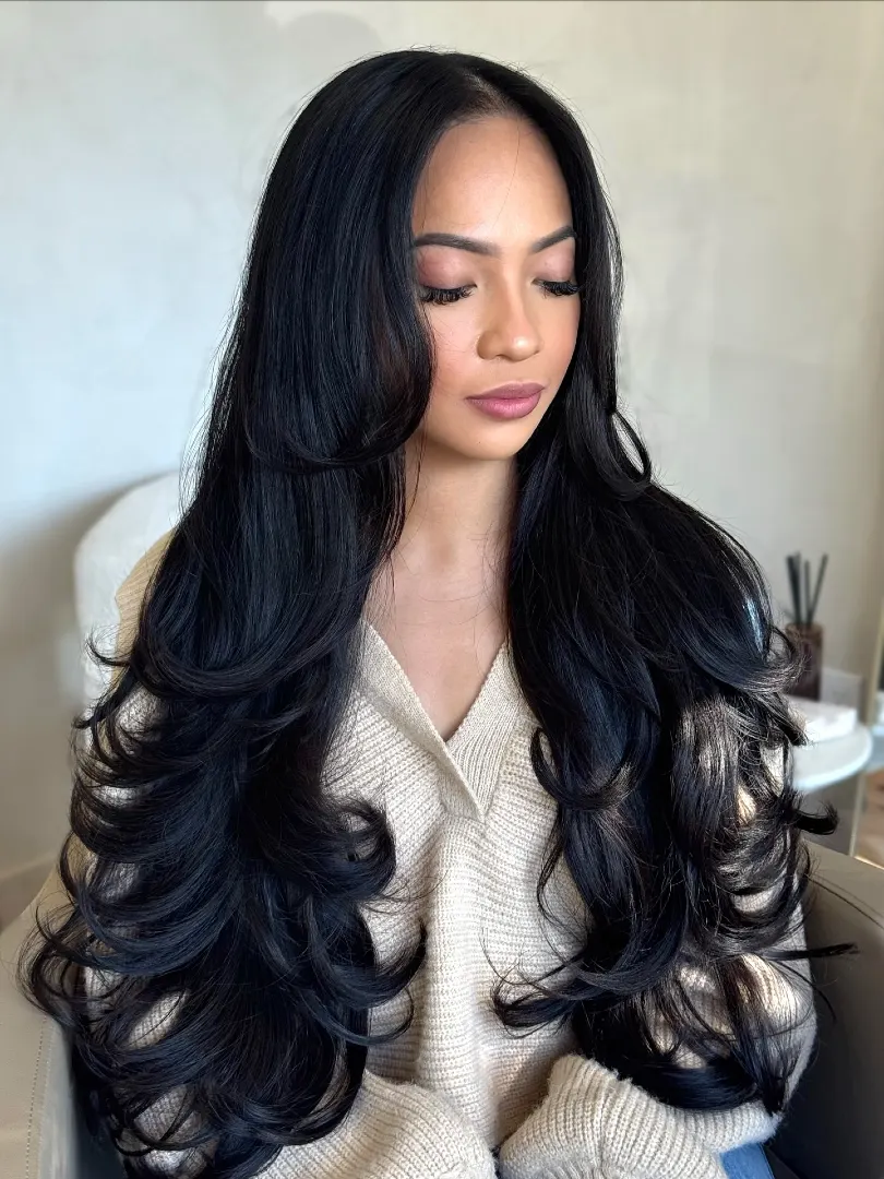 Jet Black Long Layers with Voluminous Curled Ends