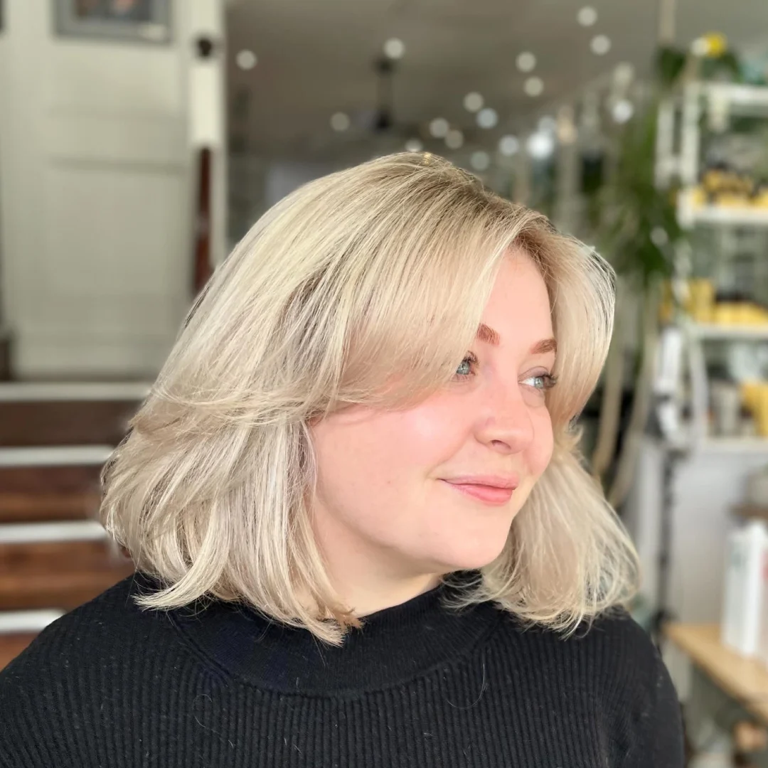 Layered Blonde Curtain Bang Bob