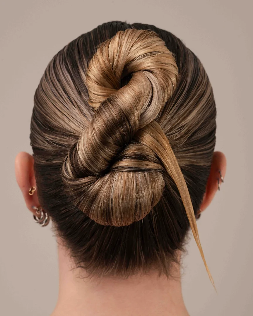 Sculptural Twisted Knot Updo with Pointed Tail