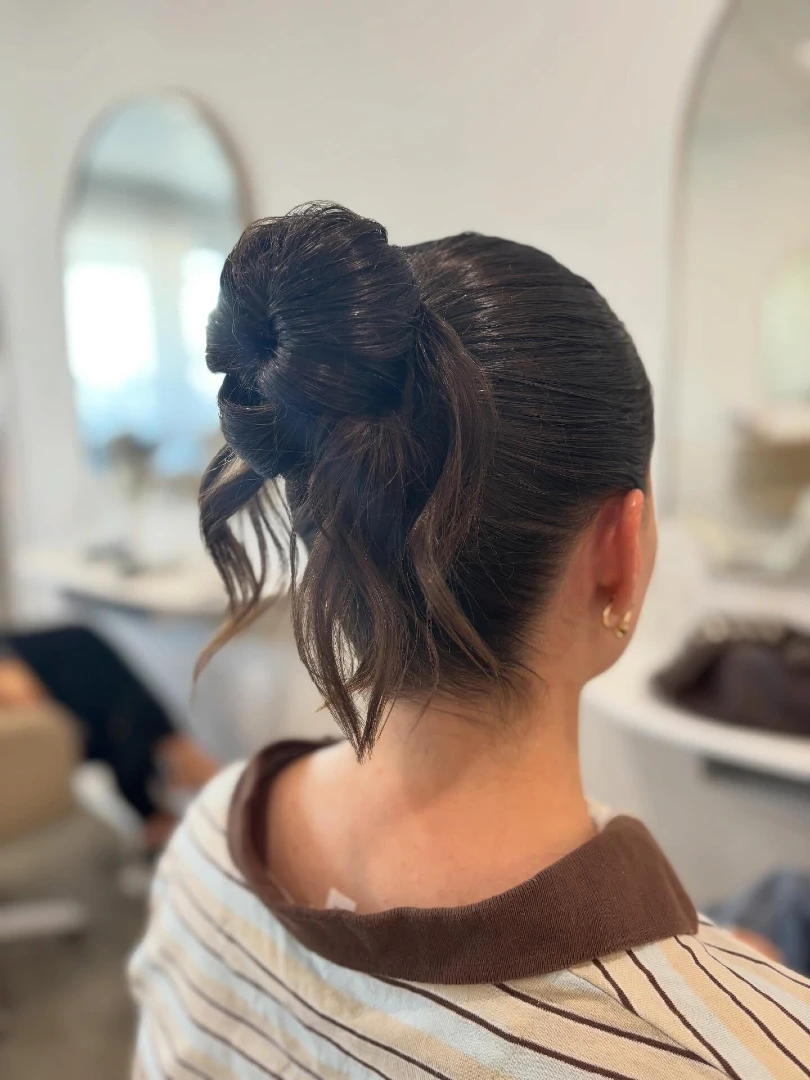 Sleek High Ponytail with Knotted Bun Top