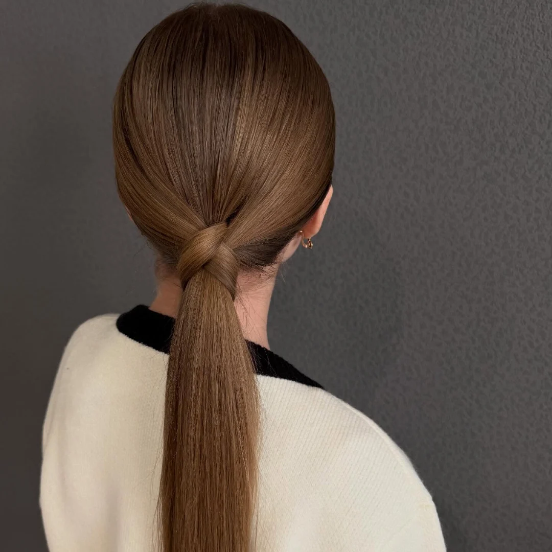 Sleek Low Ponytail with Hair Wrap