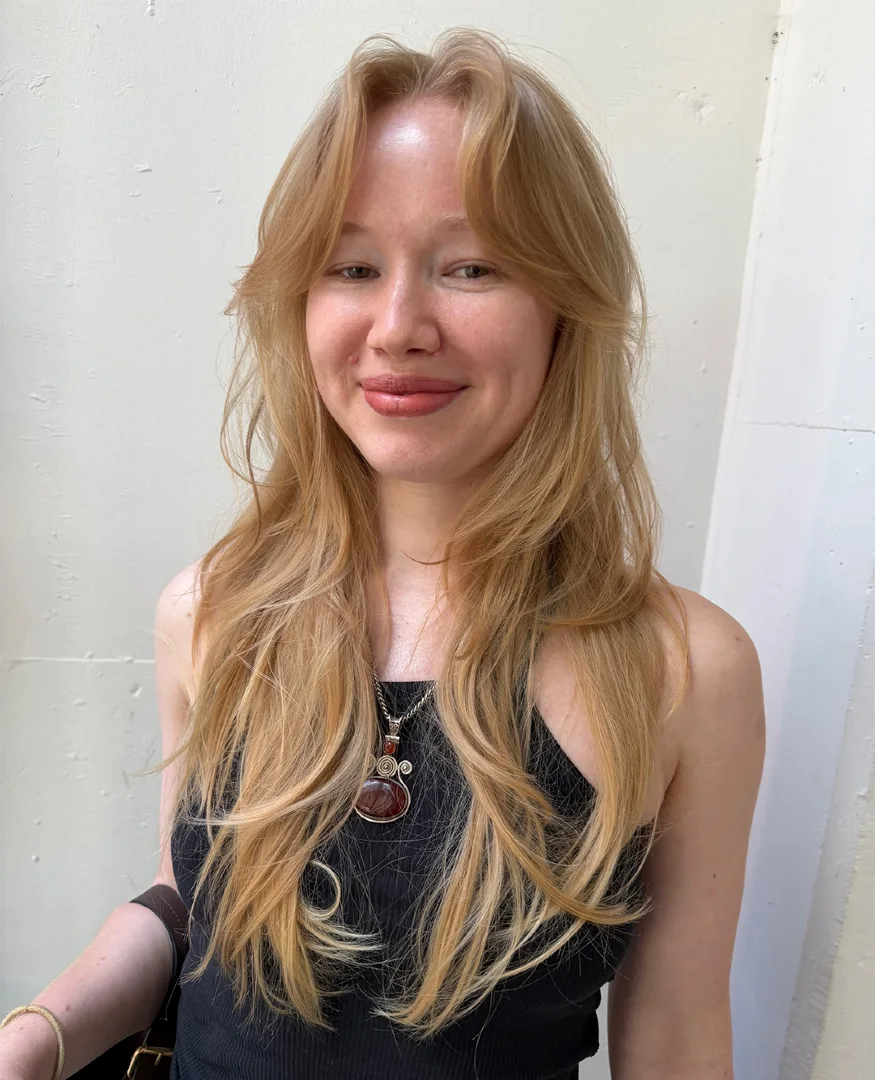 Strawberry Blonde Long Layers with Wispy Curtain Bangs