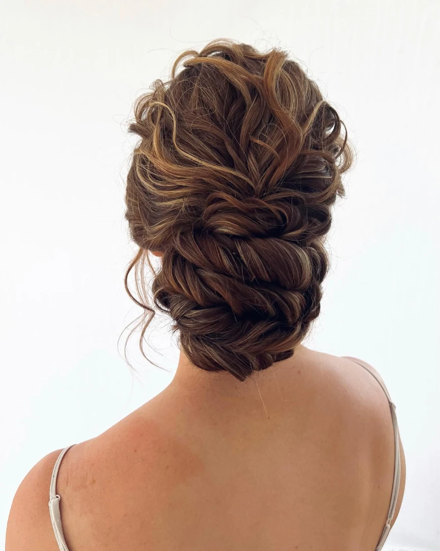 Voluminous Curly Twisted Updo with Caramel Highlights