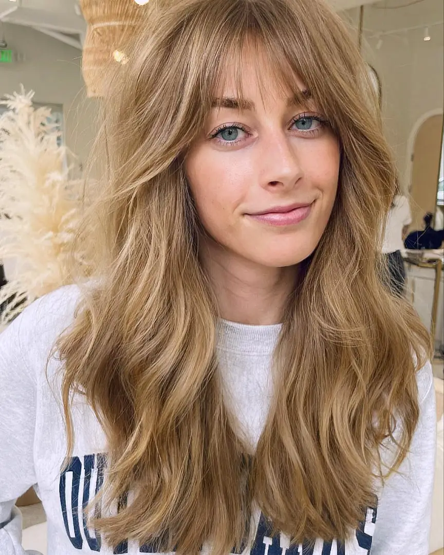 Wispy Curtain Bangs on Long Wavy Dirty Blonde Hair