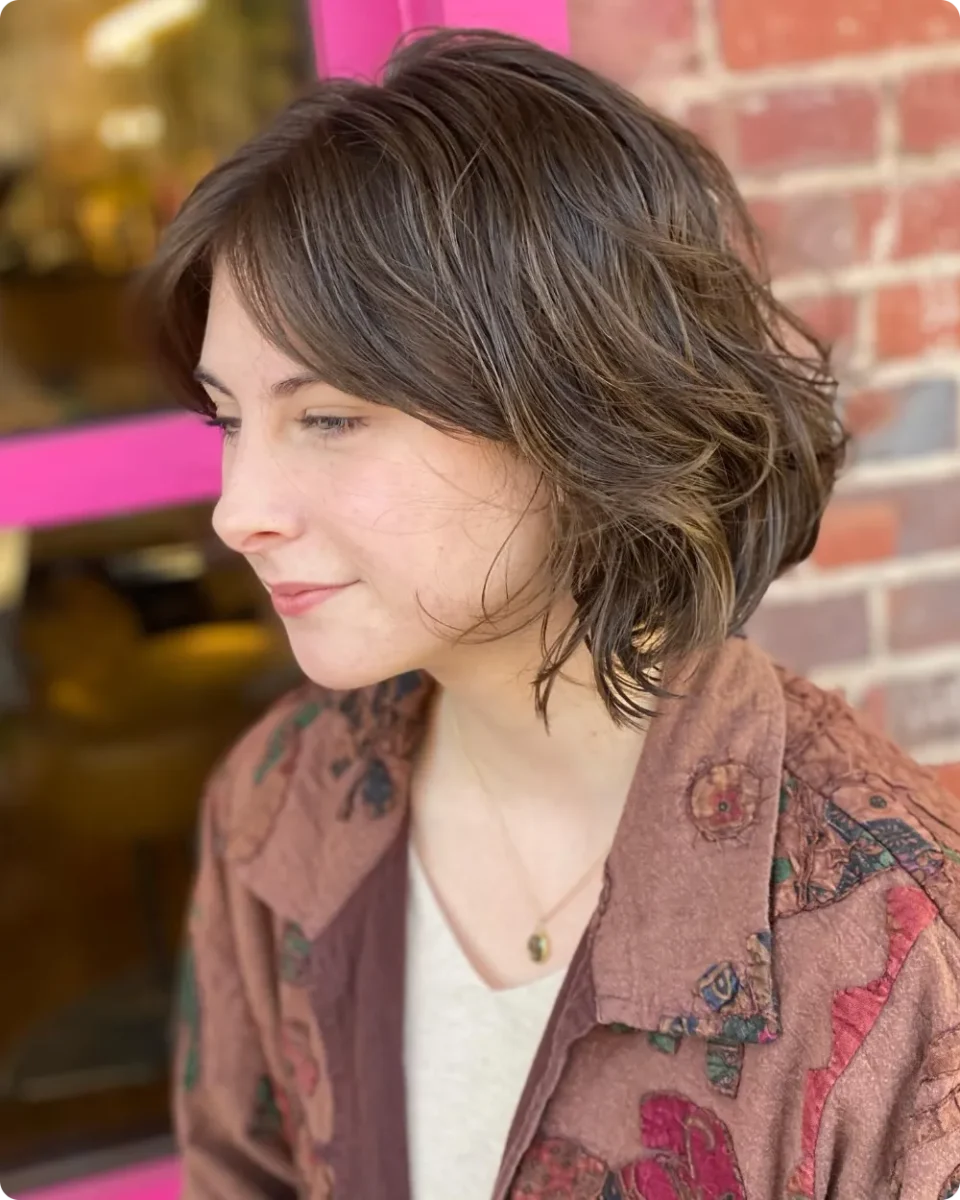 Medium brown wavy shag bob with short crown layers and separated ends